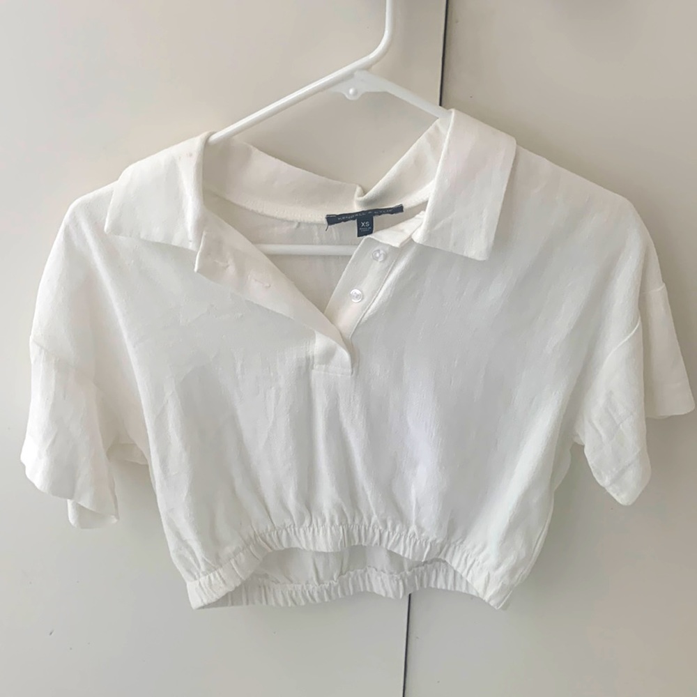Kendall & Kylie Short Sleeve Elastic Polo Shirt.